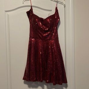 Strapless burgundy dress.